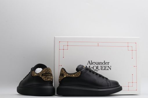 Alexander McQueen black gold tail