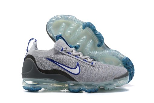 NIKE Air VaporMax Light grey blue background